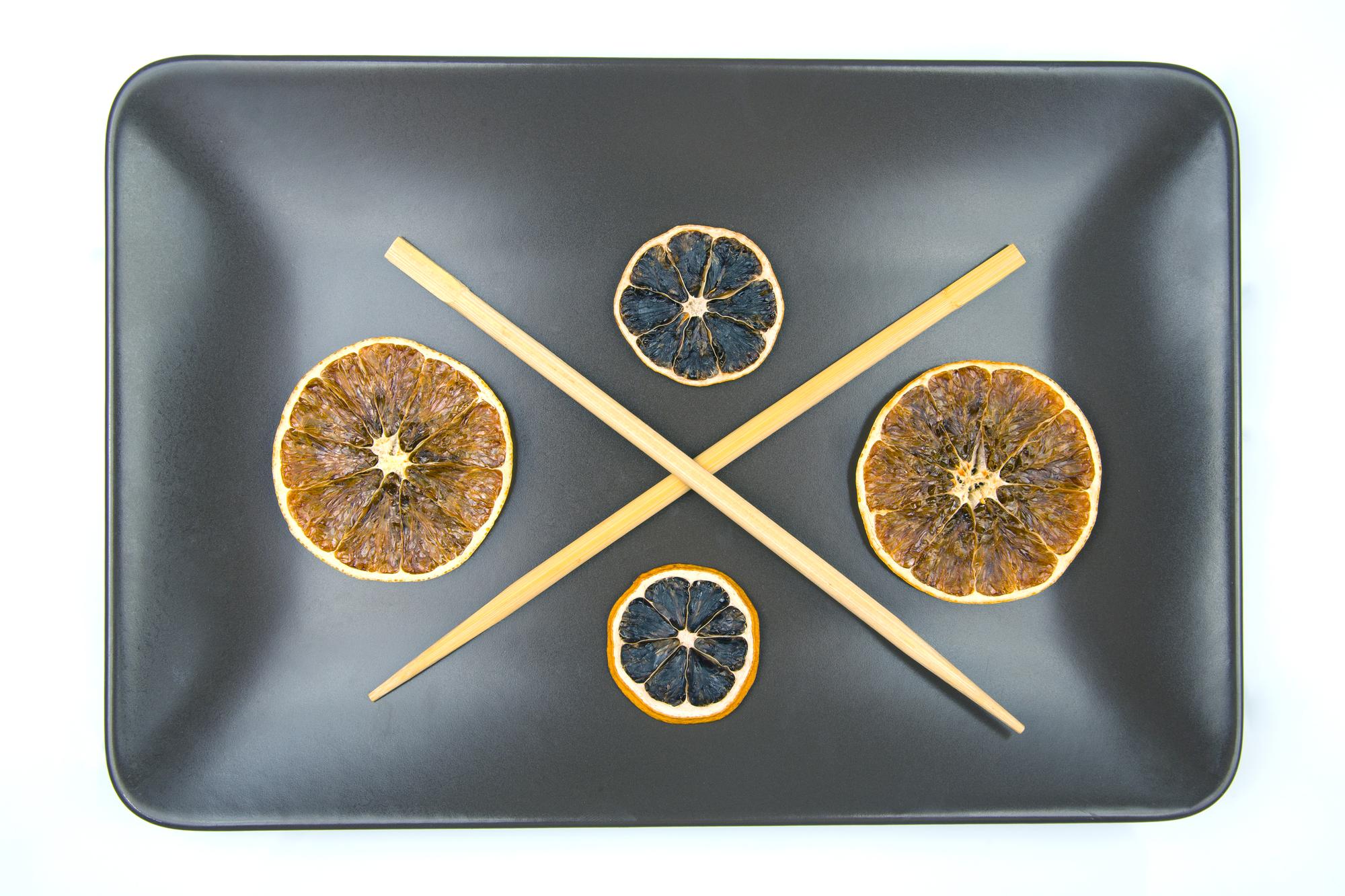 Top-down tray with precision-cut garnishes in circular mask